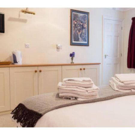 The Bull Inn Bourne Bagian luar foto